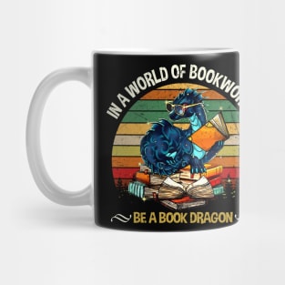 IN A WORLD OF BOOKWORMS BE A BOOK DRAGON Mug